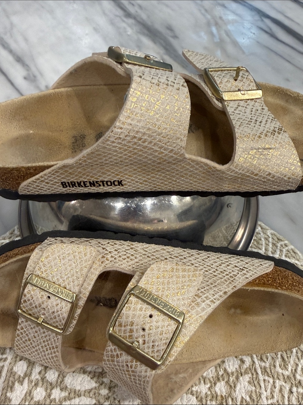 Birkenstock Arizona Two-Strap Sandals in Metallic Cream with Gold Buckles